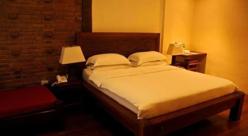 Bed in Mango Valley Hotel