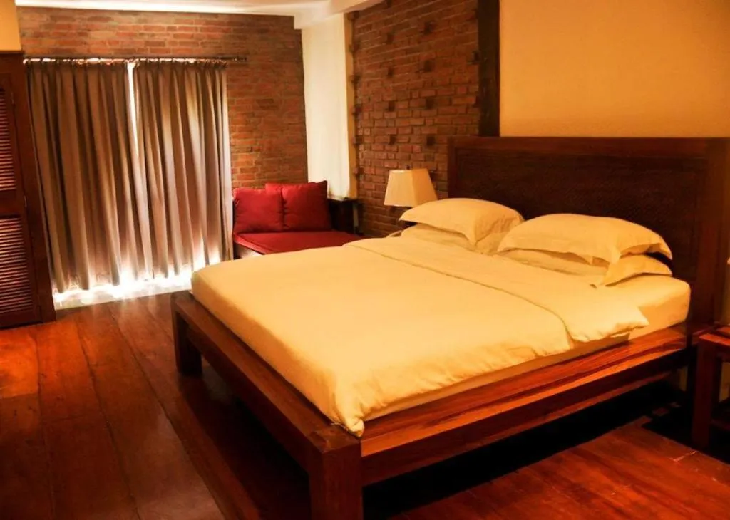 Bed in Mango Valley Hotel