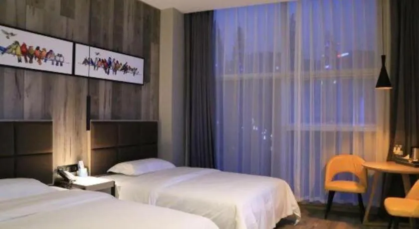 Bed in Qingdao Elegance Hotel