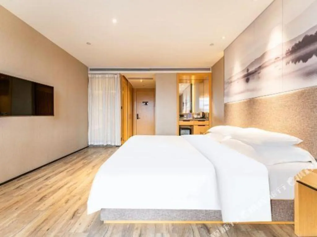 Bed in Qingdao Elegance Hotel