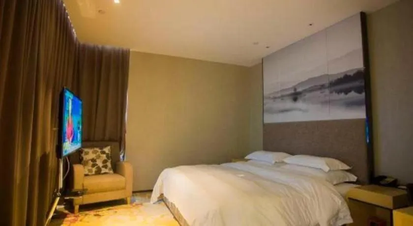 Bed in Qingdao Elegance Hotel