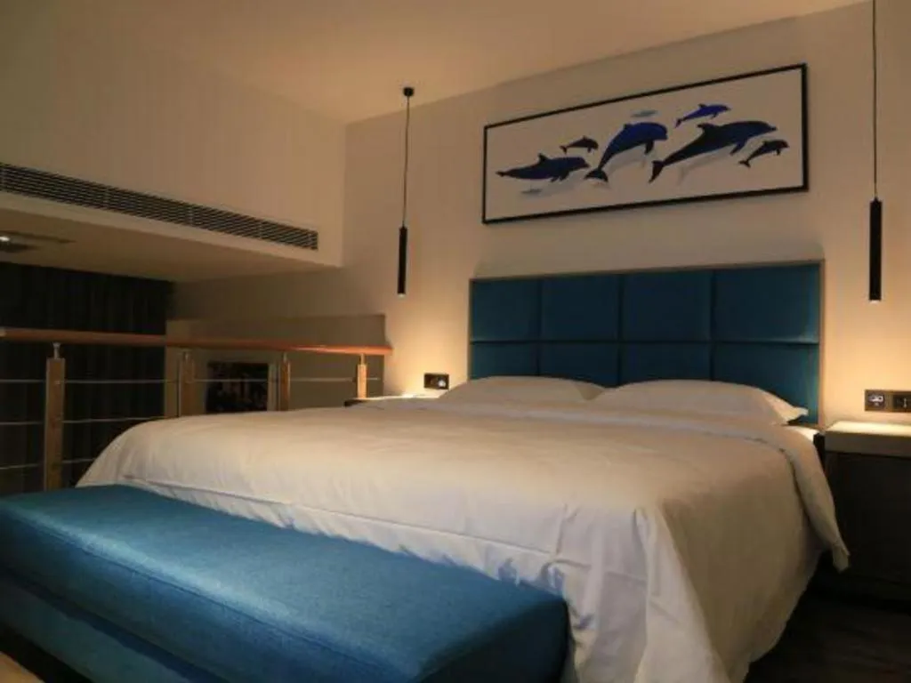 Bed in Qingdao Elegance Hotel