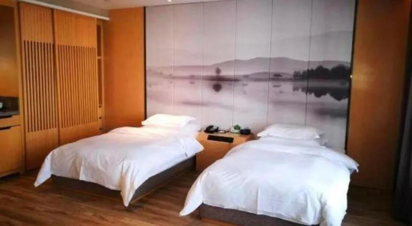 Bed in Qingdao Elegance Hotel