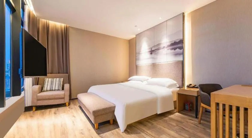 Bed in Qingdao Elegance Hotel