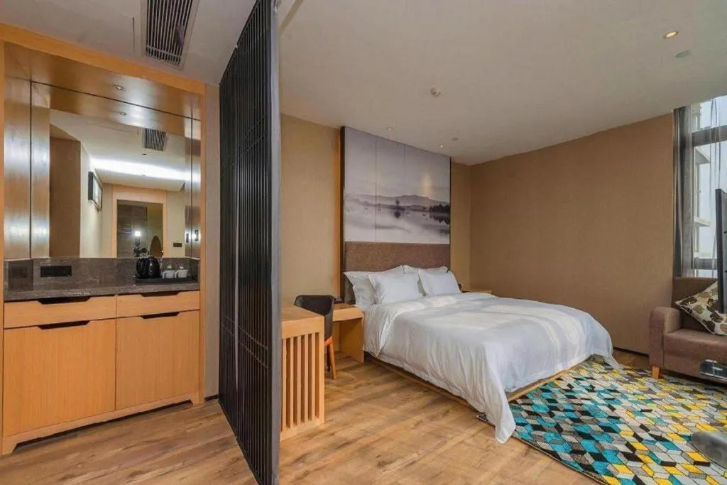 Bed in Qingdao Elegance Hotel