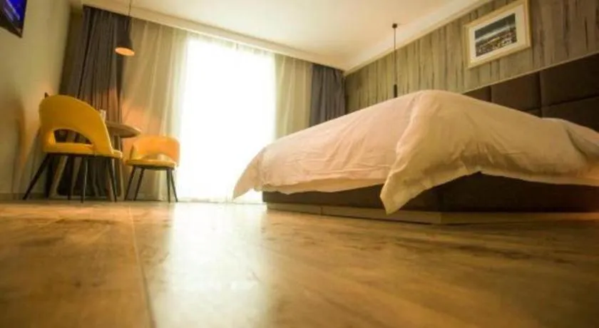 Bed in Qingdao Elegance Hotel