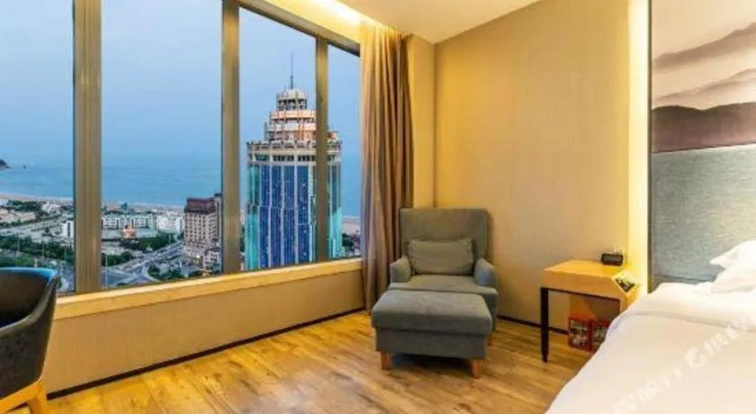 Bed in Qingdao Elegance Hotel