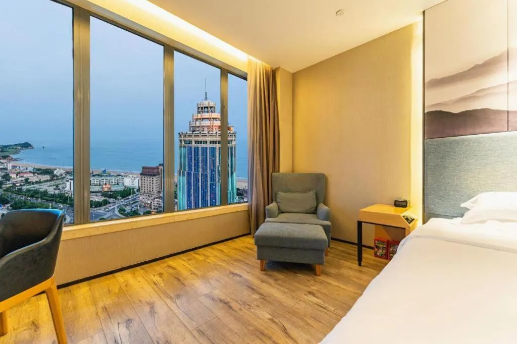 Bed in Qingdao Elegance Hotel