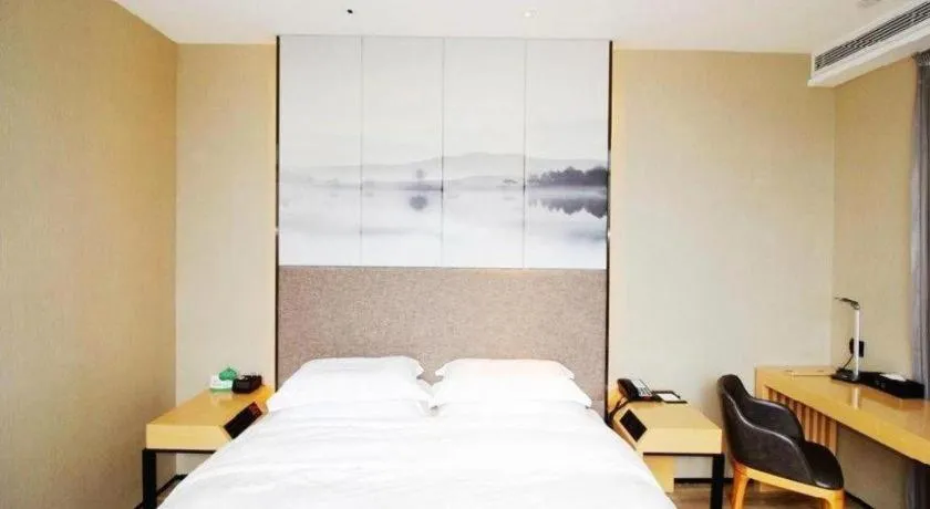 Bed in Qingdao Elegance Hotel