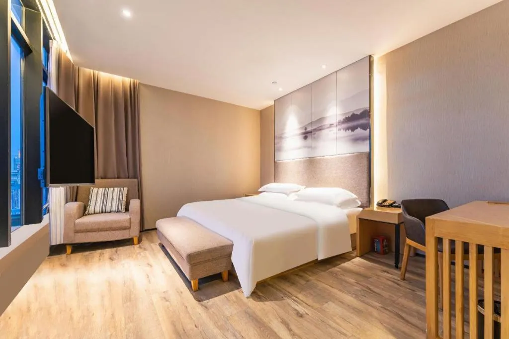 Bed in Qingdao Elegance Hotel