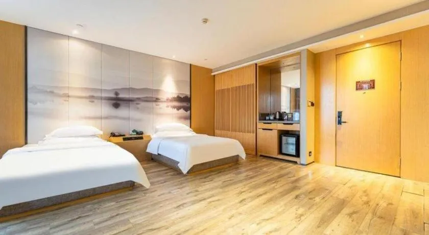 Bed in Qingdao Elegance Hotel