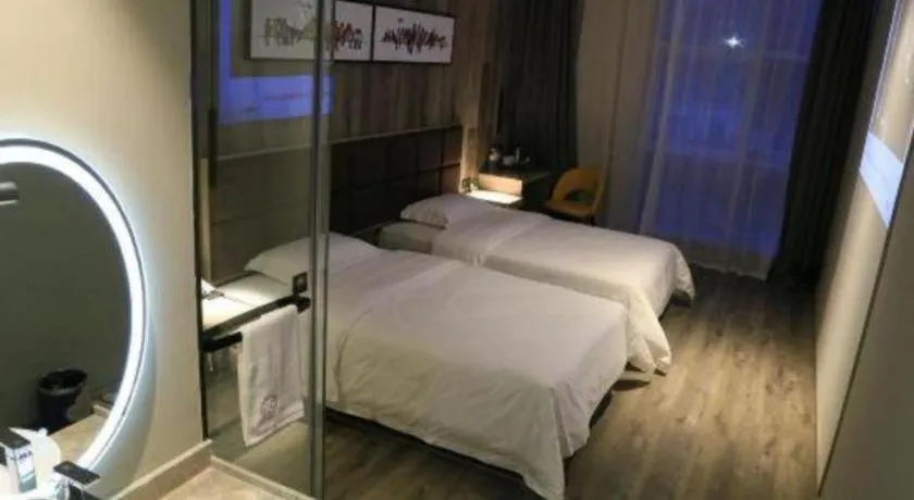 Bed in Qingdao Elegance Hotel