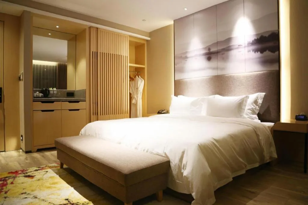 Bed in Qingdao Elegance Hotel