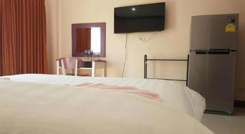 Bed in V-House Hotel