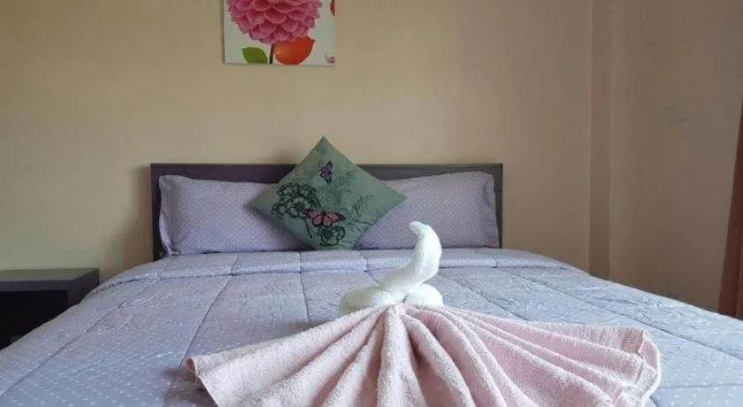 Bed in V-House Hotel