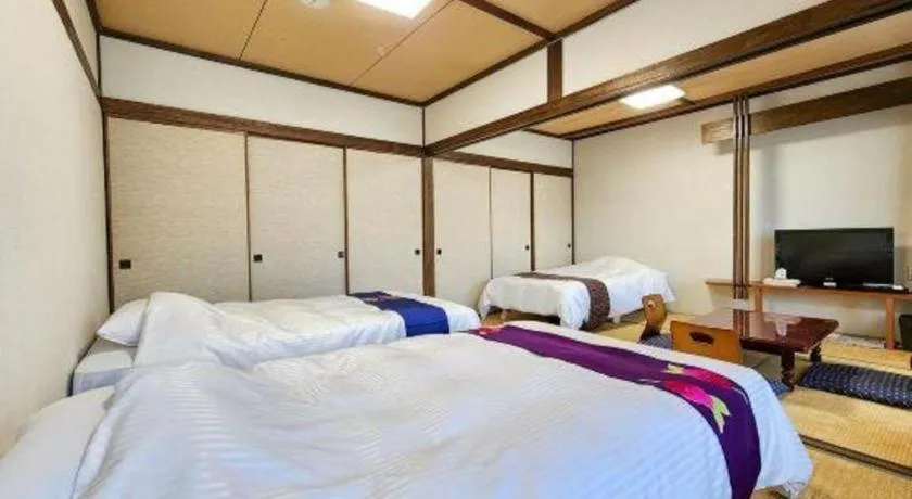 Bed in Yunosawa Onsen Mori no Shiki