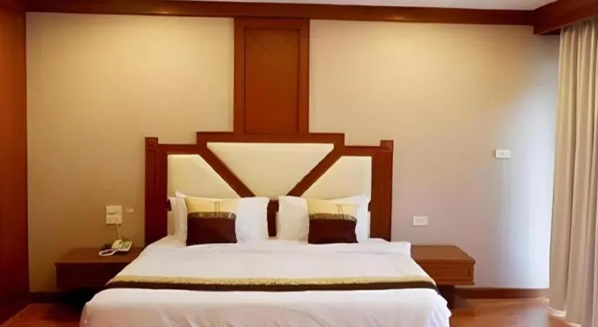 Bed in The Impress Nan Hotel