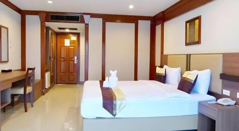 Bed in The Impress Nan Hotel