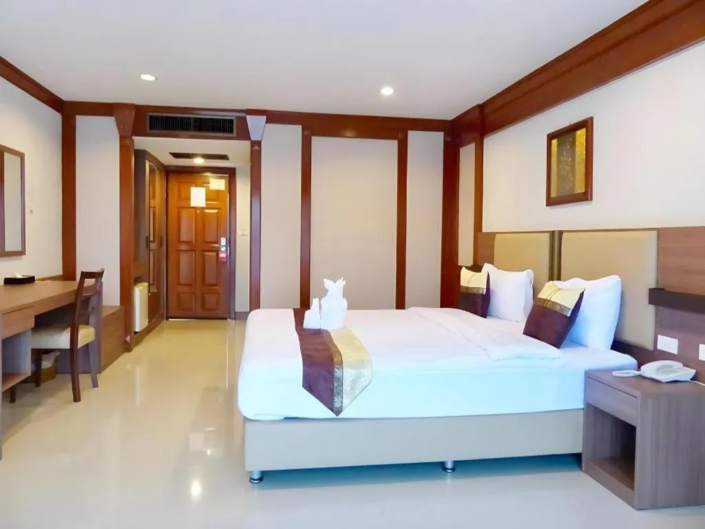 Bed in The Impress Nan Hotel