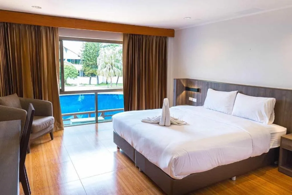 Bed in The Impress Nan Hotel