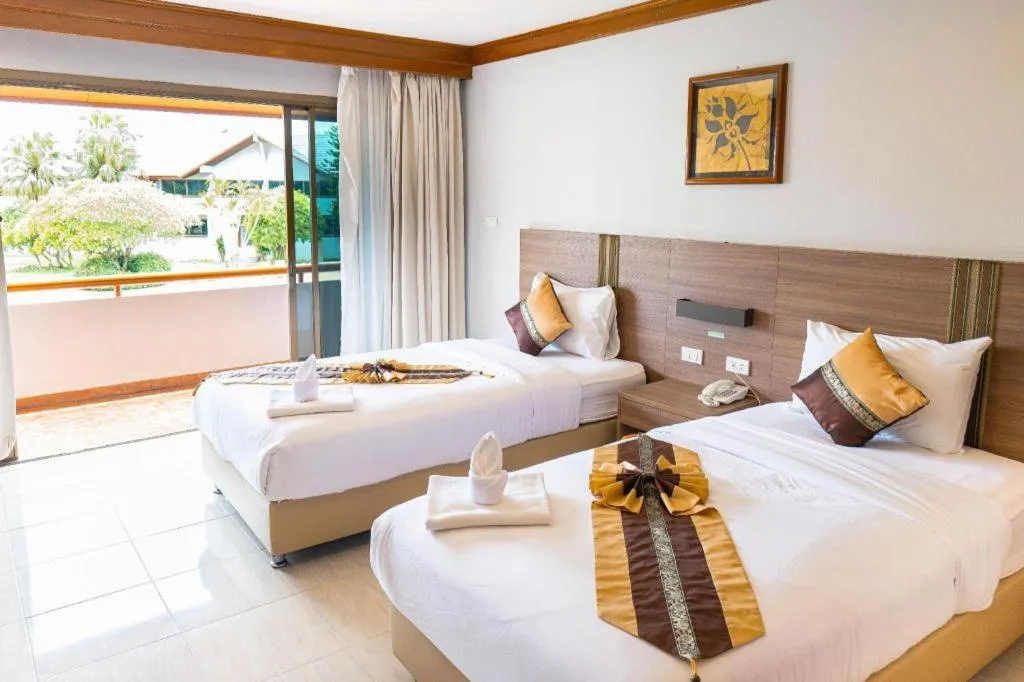 Bed in The Impress Nan Hotel