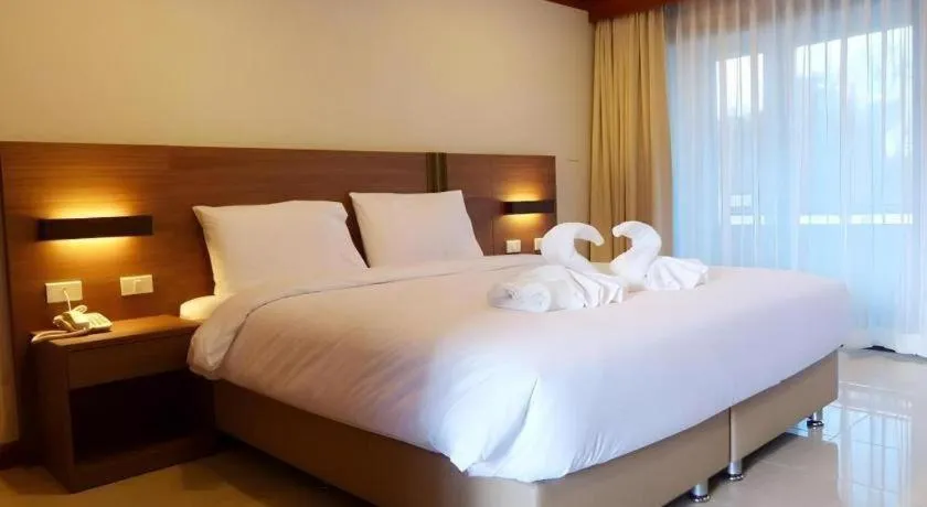 Bed in The Impress Nan Hotel