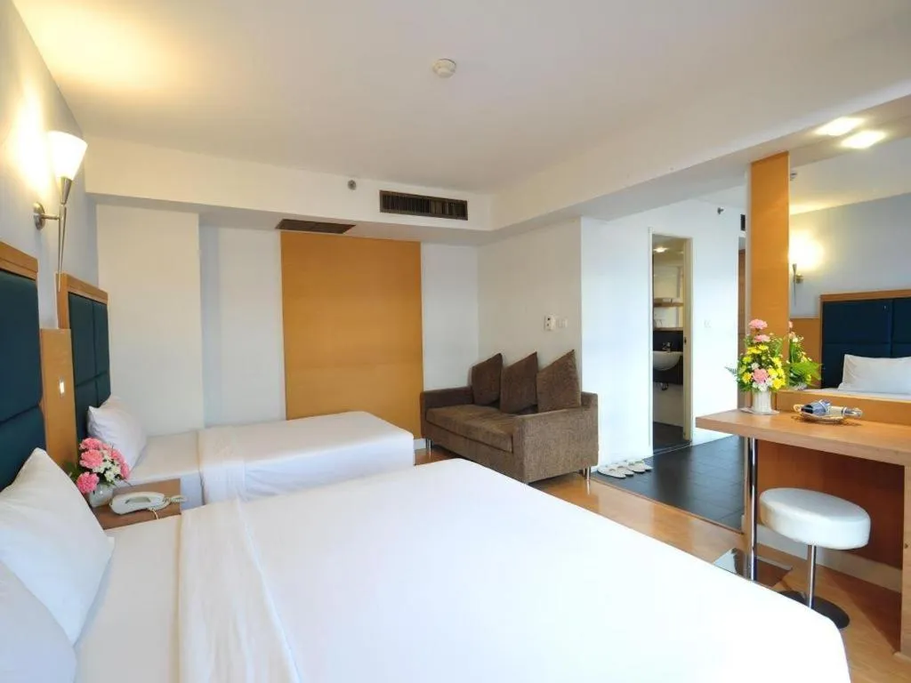 Bed in Mayflower Grande Hotel