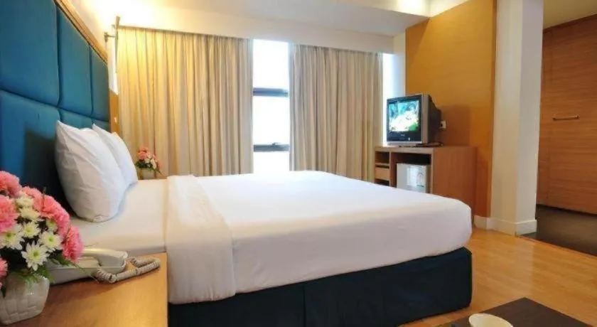 Bed in Mayflower Grande Hotel