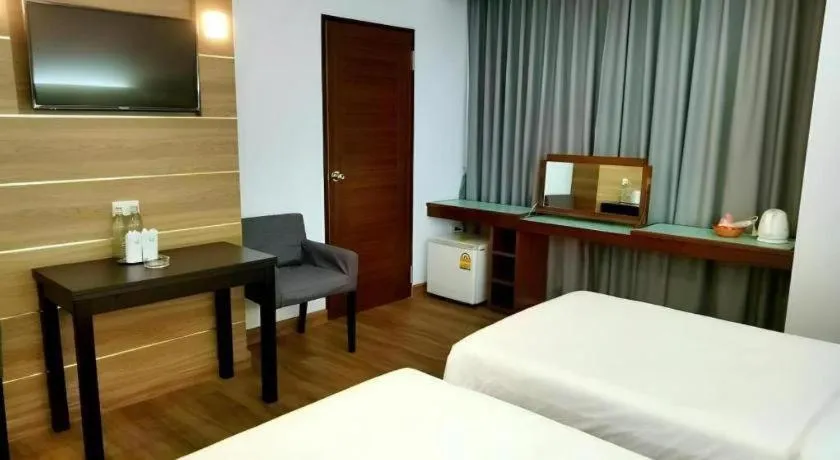 Bed in Mayflower Grande Hotel