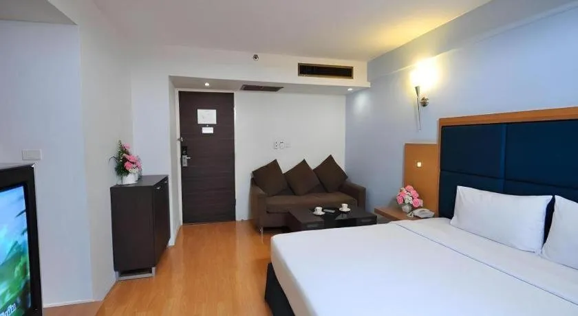 Bed in Mayflower Grande Hotel