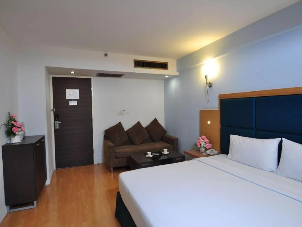 Bed in Mayflower Grande Hotel