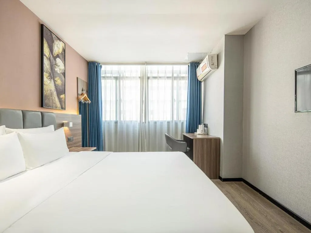 Bed in 7 Days Inn Yingshang Lanxing Building Materials Market