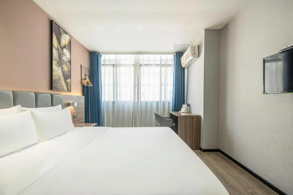 Bed in 7 Days Inn Yingshang Lanxing Building Materials Market