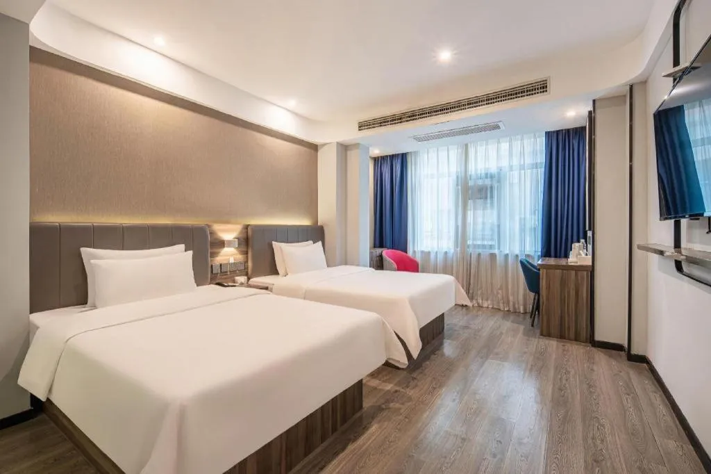 Bed in 7 Days Inn Yingshang Lanxing Building Materials Market