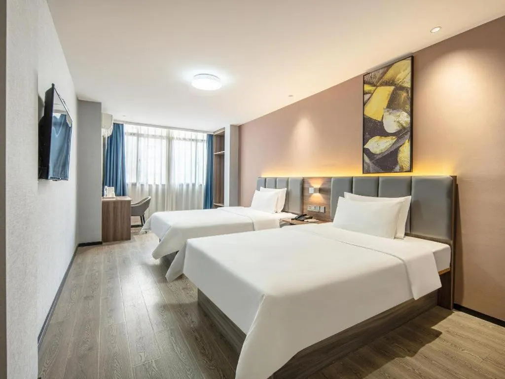 Bed in 7 Days Inn Yingshang Lanxing Building Materials Market