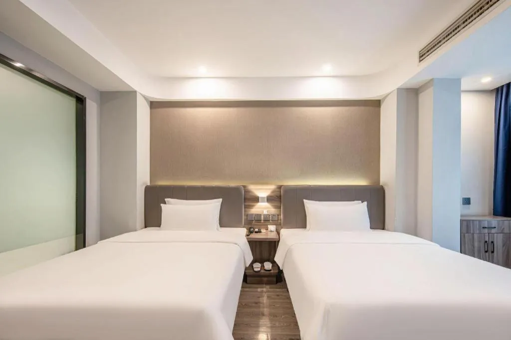 Bed in 7 Days Inn Yingshang Lanxing Building Materials Market