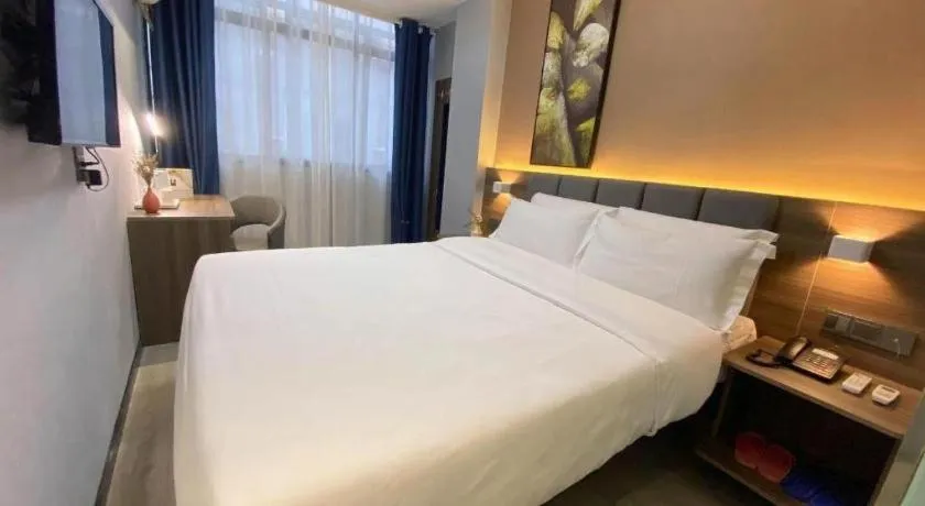 Bed in 7 Days Inn Yingshang Lanxing Building Materials Market