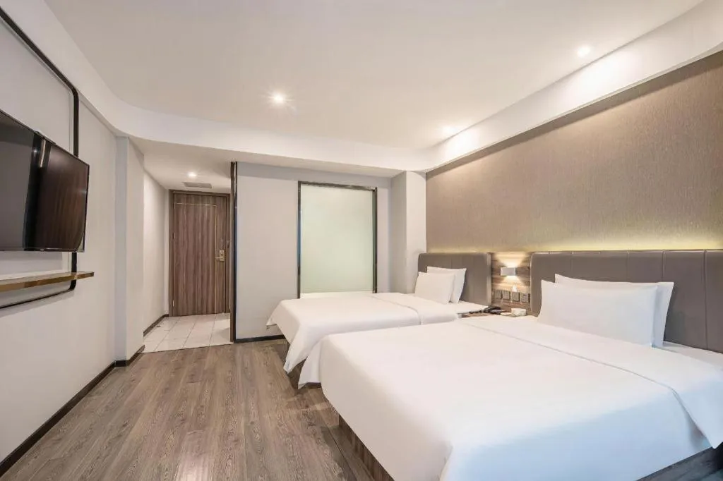 Bed in 7 Days Inn Yingshang Lanxing Building Materials Market