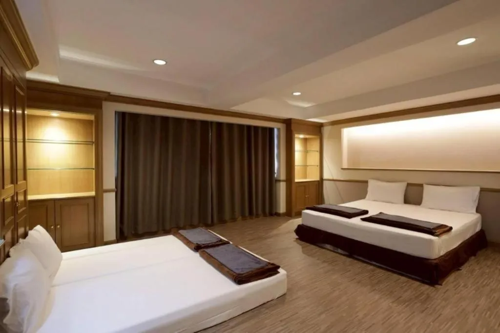Bed in Alameda Suites Hotel