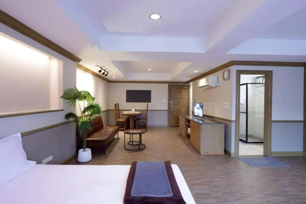 Bed in Alameda Suites Hotel