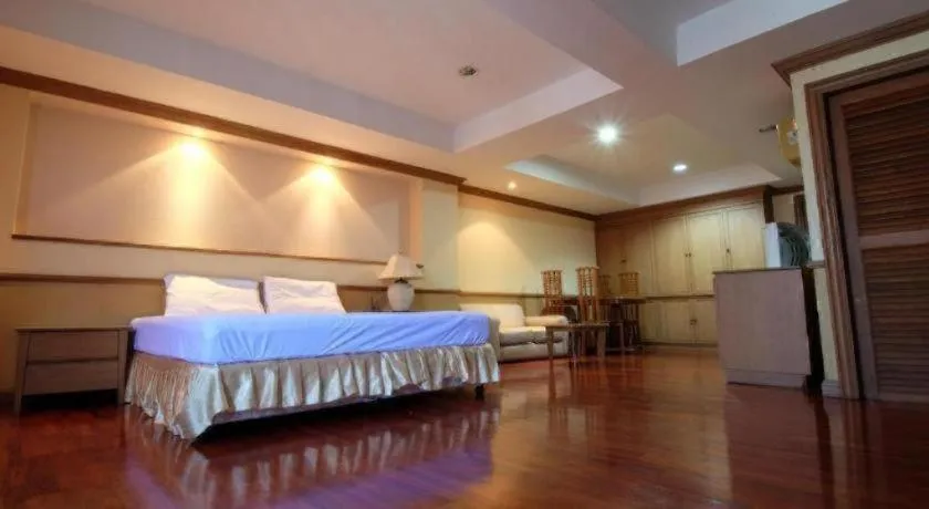 Bed in Alameda Suites Hotel