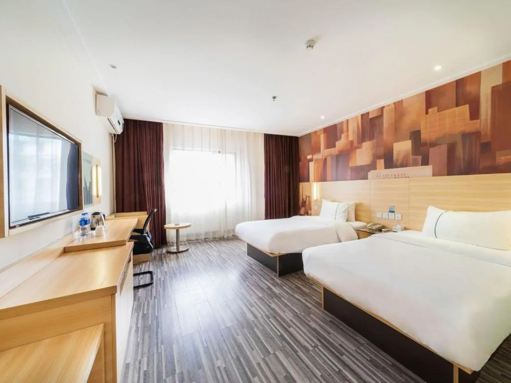 Bed in City Comfort Inn Zhongshan Lihe Square Walmart Branch