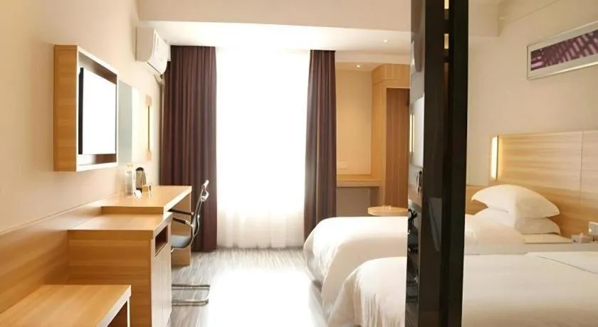 Bed in City Comfort Inn Zhongshan Lihe Square Walmart Branch