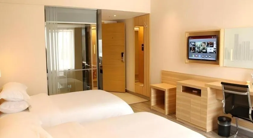 Bed in City Comfort Inn Zhongshan Lihe Square Walmart Branch