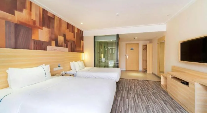 Bed in City Comfort Inn Zhongshan Lihe Square Walmart Branch