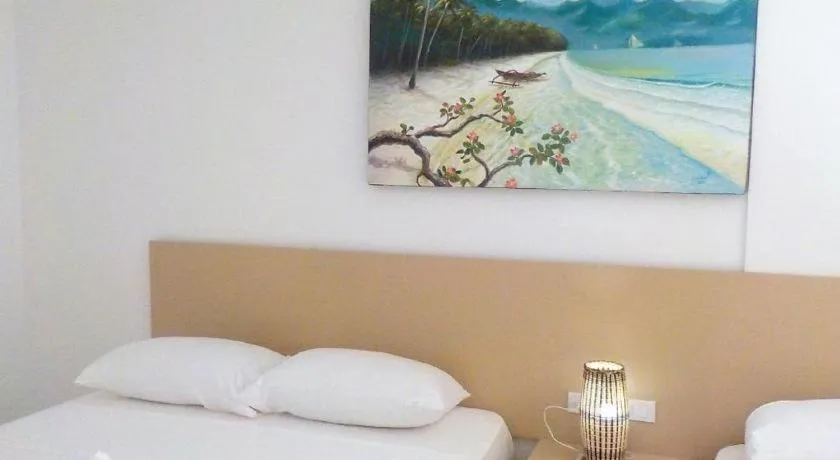 Bed in Jeffrey S Hotel