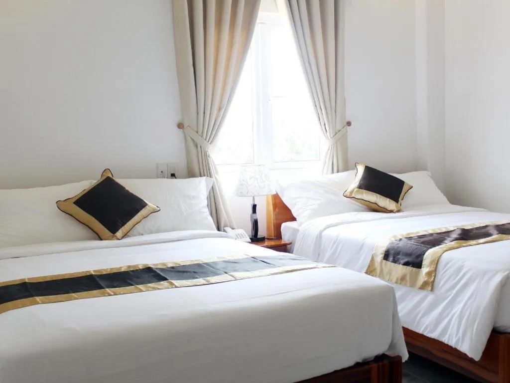 Bed in Hong Mai Hotel Nha Trang