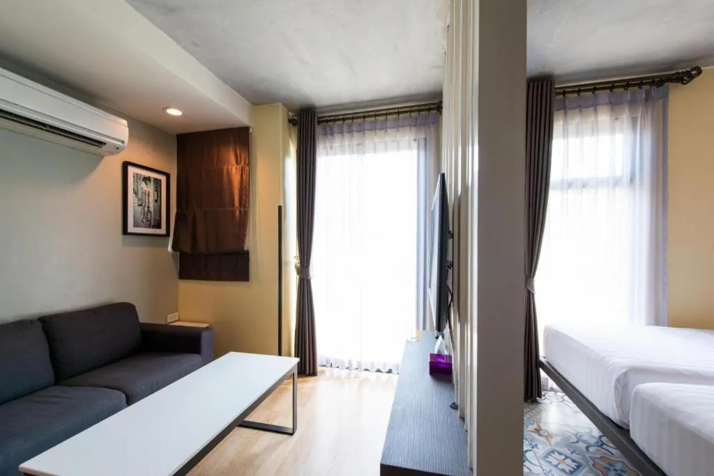 Bed in BB House Mini Suite Hotel