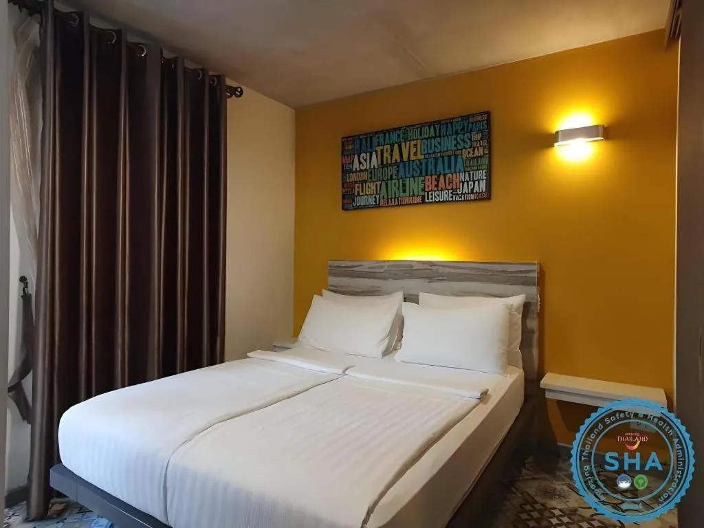 Bed in BB House Mini Suite Hotel