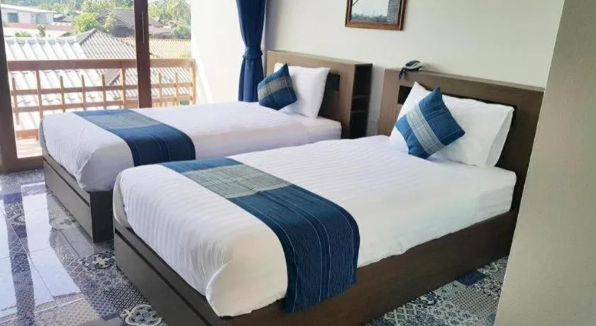 Bed in The Indigo House Phrae